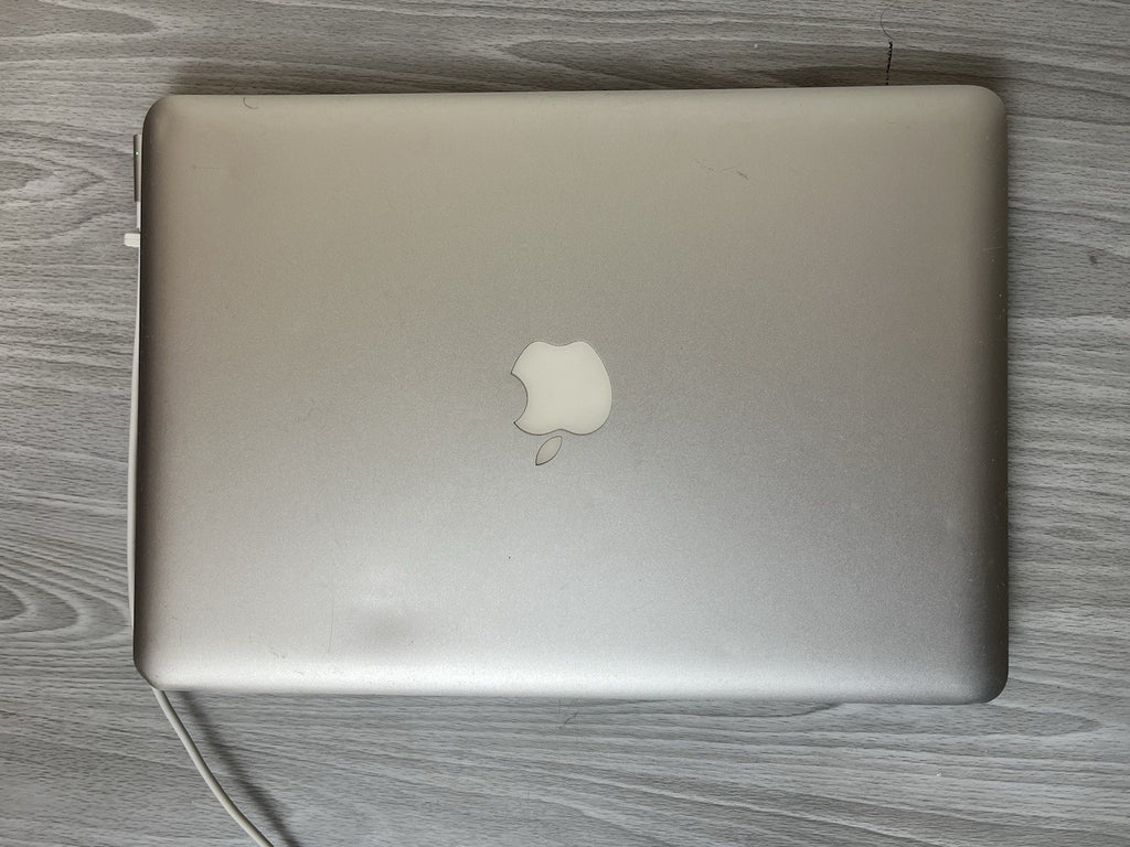 MacBook Pro 13-inch, 320GB, 4GB Ram, 2.3GHz Intel Core i5, Tested & Working