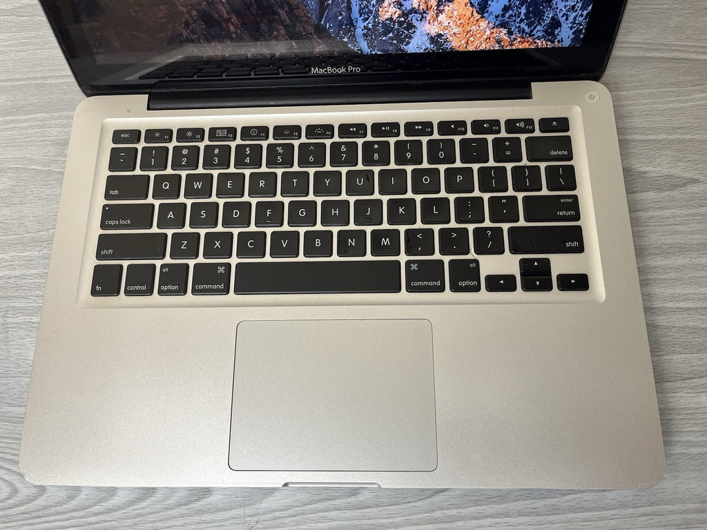MacBook Pro 13-inch, 320GB, 4GB Ram, 2.3GHz Intel Core i5, Tested & Working