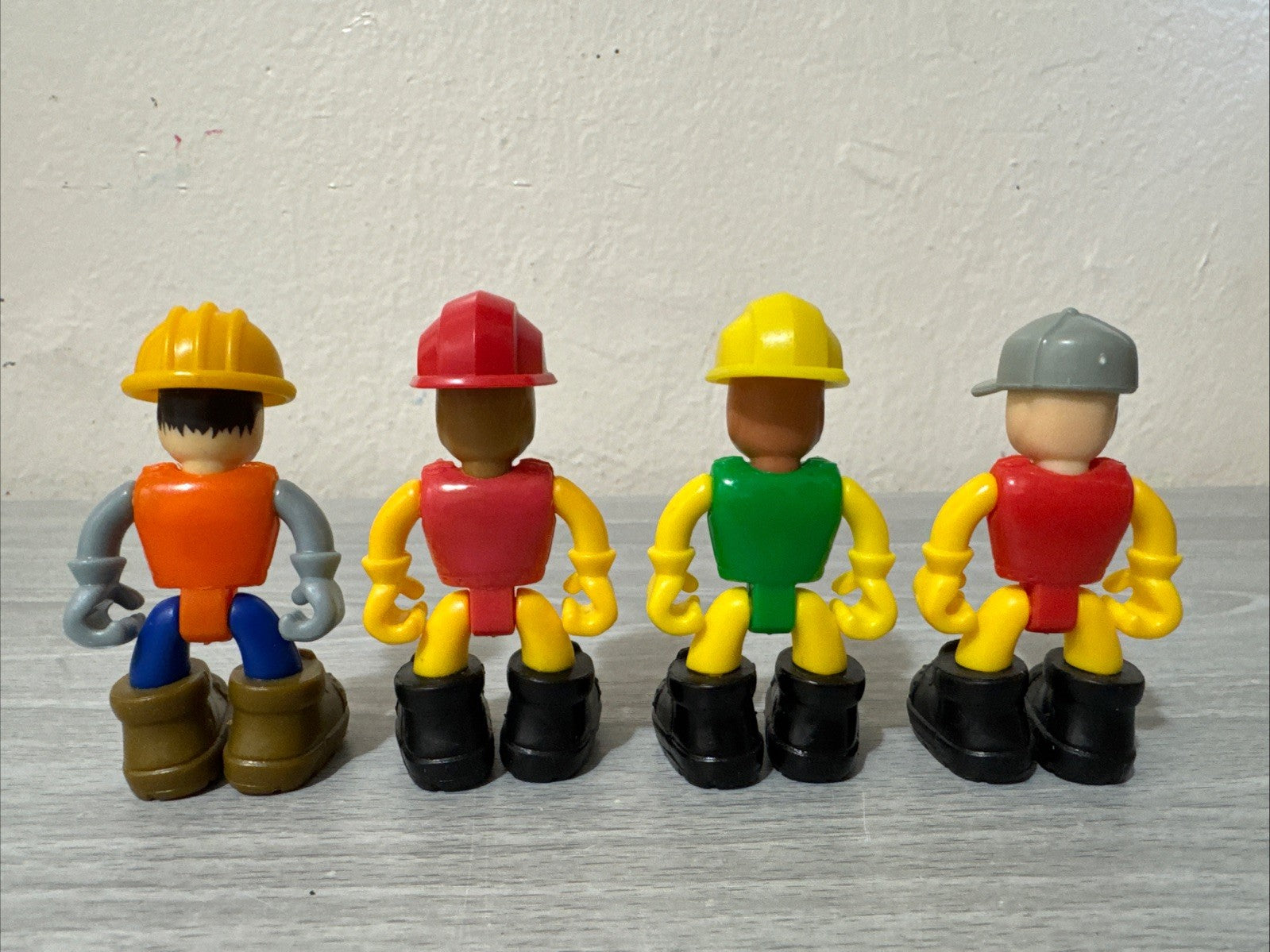 Nikko Toys LOT OF 4 2 Construction Workers 1 Fireman And 1 Machine Maker Figures